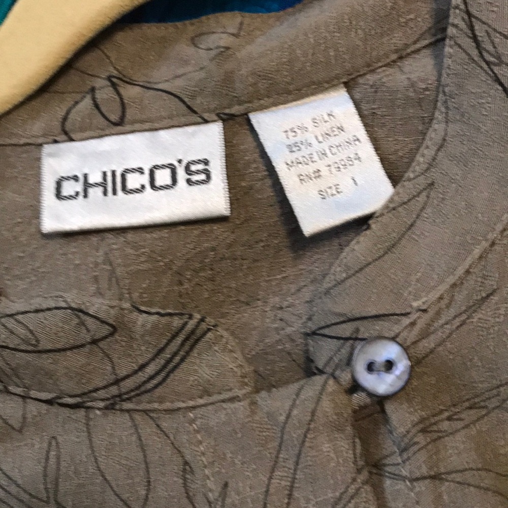 Chico’s tan blouse with black botanicals.